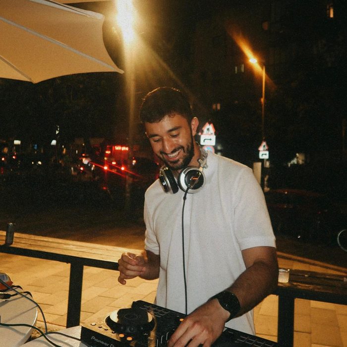 DALELAD behind the decks at an outdoor night set in Tel Aviv