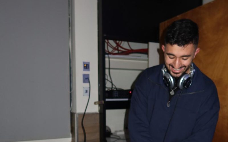 DALELAD behind the decks at a university event